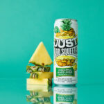 can of just hard squeezed pineapple next to pieces of cut pineapple