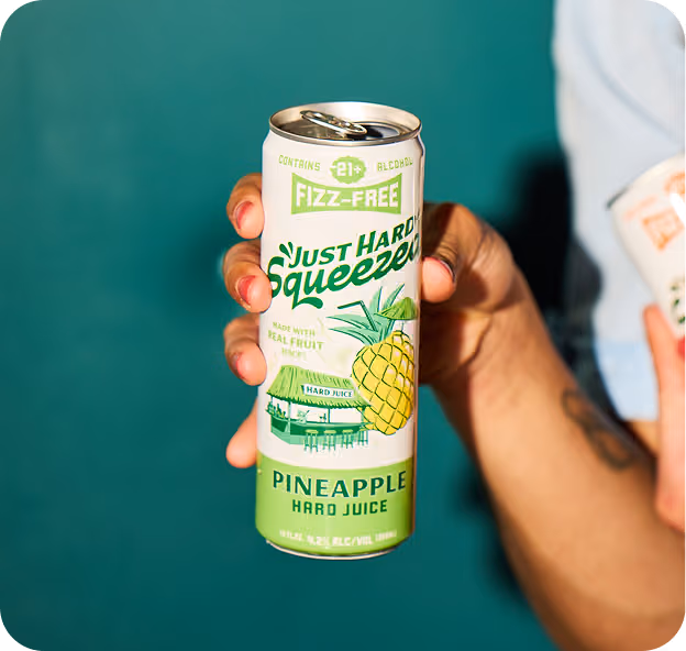 A can of Pineapple Just Hard Squeezed