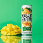 can of just hard squeezed mango next to a fresh mango, cut